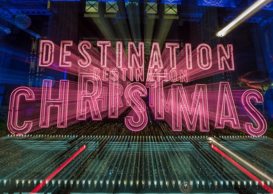 A giant neon sign saying Destination Christmas outside Selfridges