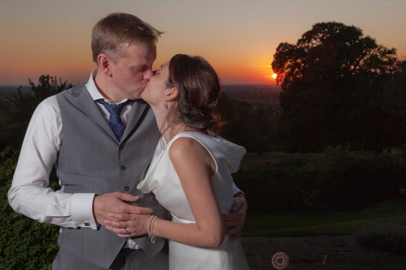 Ozgo Wedding Photography - Bride and Groom kissing at sunset