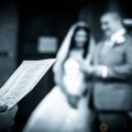 Ozgo Wedding Photography - Bride and groom reading in the church