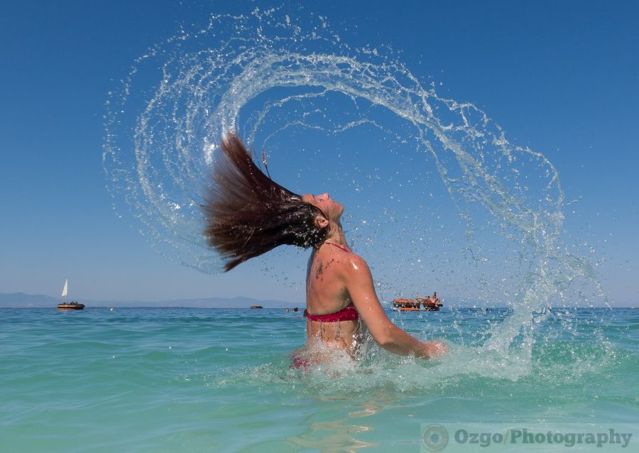 Women hair splash in water