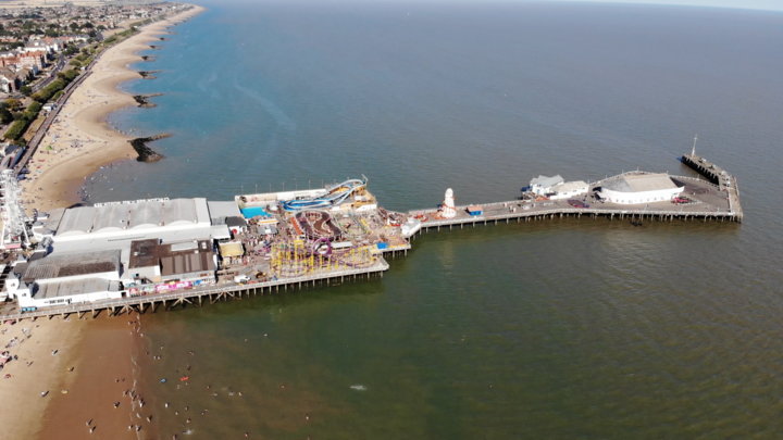 Aerial view of Clacton-on-Sea pier on a sunny afternoon poster